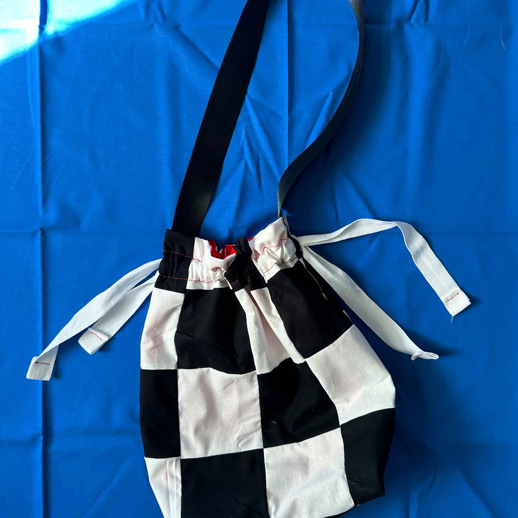 Checkered drawstring bag